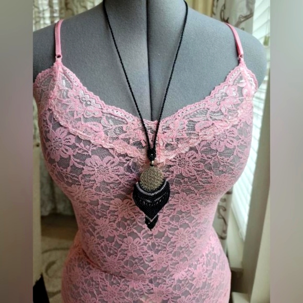 Adjustable handmade macramé necklace with Flower of Life medallion